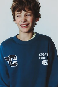TEXT JOGGING SWEATSHIRT