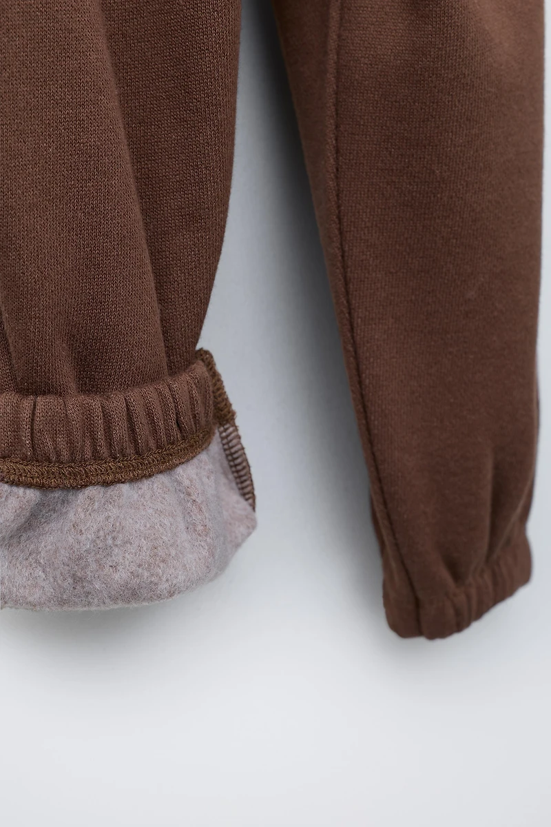 PANTALON DE JOGGING À INSCRIPTION FLOCKÉE