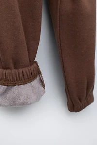 PANTALON DE JOGGING À INSCRIPTION FLOCKÉE