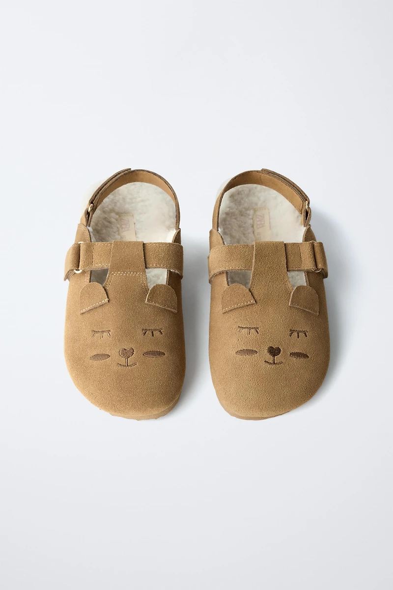 ANIMAL PRINT LEATHER CLOGS