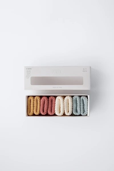 FOUR-PACK OF SOCKS WITH COLORED BOX