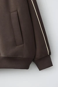 VESTE SPORT À LISERÉ EN CONTRASTE
