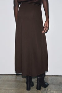 CUT-OUT KNIT SKIRT WITH BELT