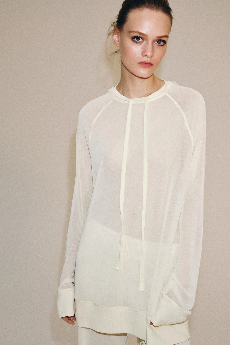 SWEAT FLUIDE SEMI-TRANSPARENT