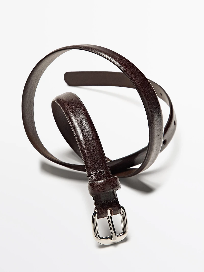 Leather belt with arched buckle