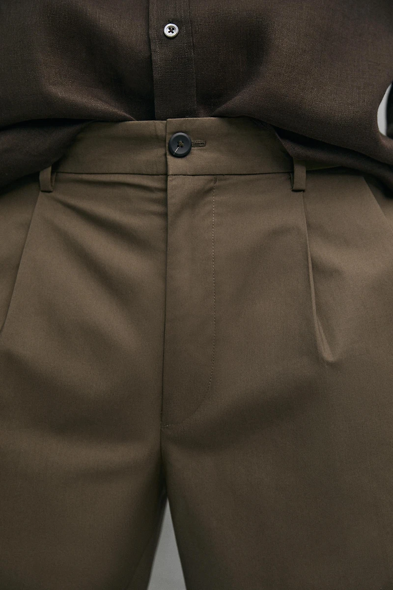 Cotton trousers with double darts