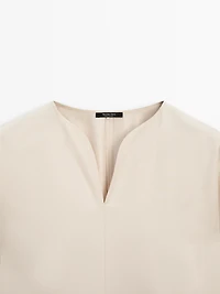 Flowing blouse with slit details