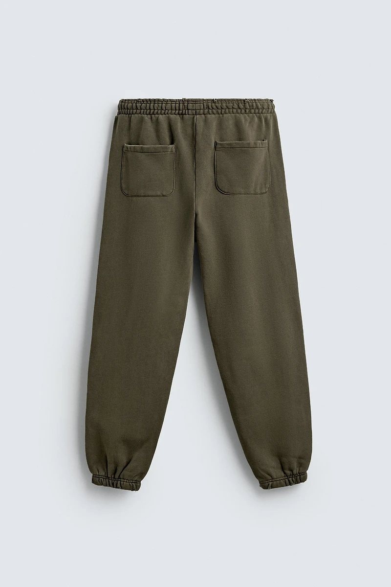 WASHED EFFECT RELAXED FIT PANTS