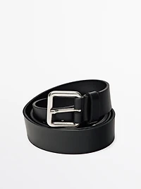 Leather belt with metallic buckle