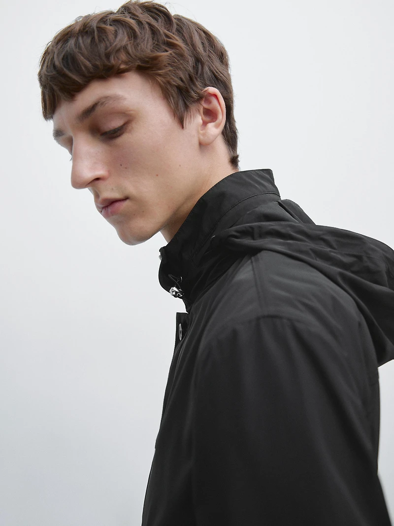 Hooded parka with fabric detail