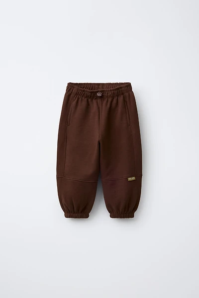 PANTALON DE JOGGING DOUX AVEC ÉTIQUETTE