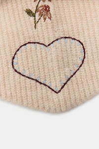 EMBROIDERED KNIT HOOD