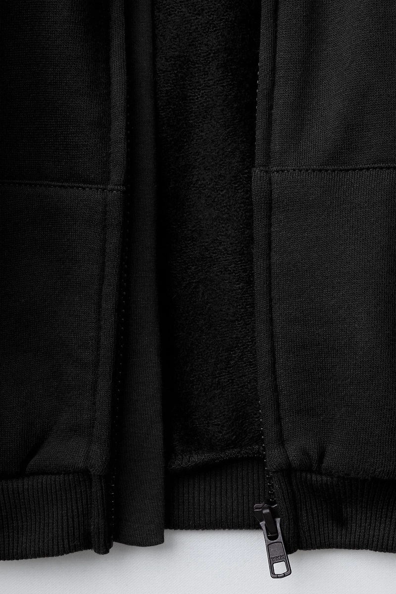 ZIP-UP TEXT SWEATSHIRT