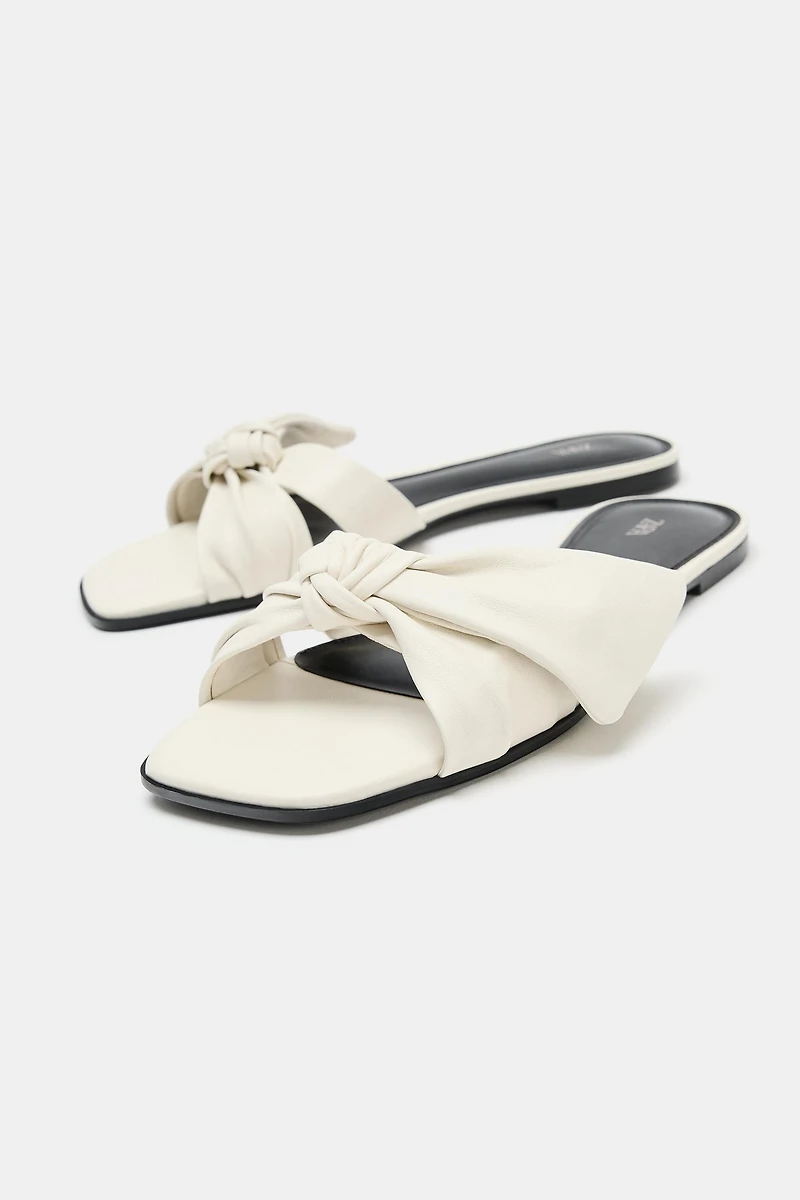 LEATHER BOW FLAT SANDALS