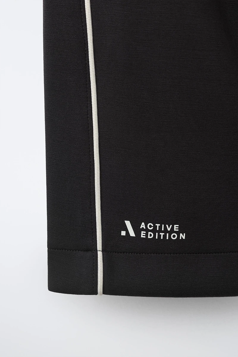 ATHLETIC SHORTS WITH CONTRAST PIPING