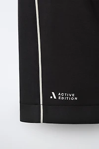 ATHLETIC SHORTS WITH CONTRAST PIPING