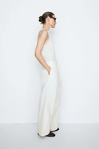 Pleated pants with crossover fastening detail - STUDIO