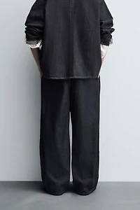 PLEATED WIDE FIT JEANS