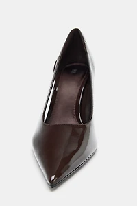 HEELS WITH SIDE OPENINGS