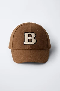 CASQUETTE EN DRAP INITIALE