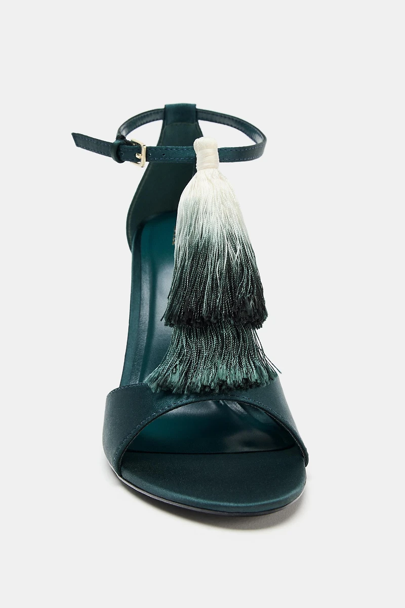 TASSEL HEELED SANDALS