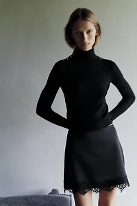 BUTTON KNIT SWEATER