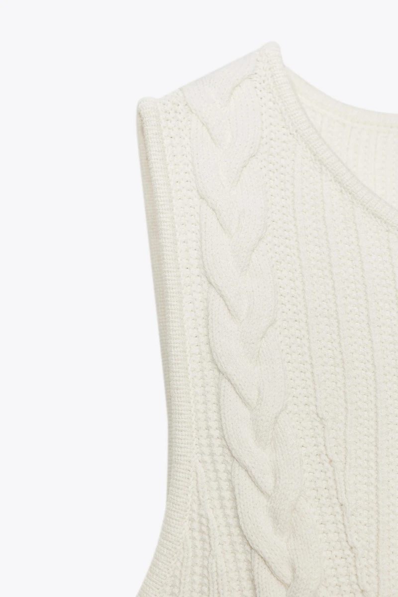 CABLE KNIT PEPLUM TOP