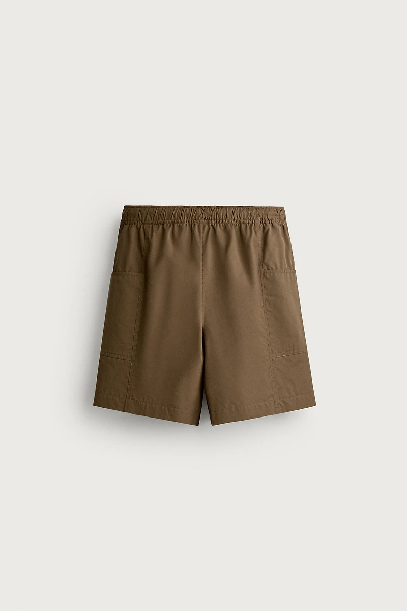 SEAMED SWIM SHORTS