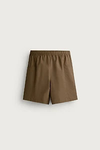 SEAMED SWIM SHORTS