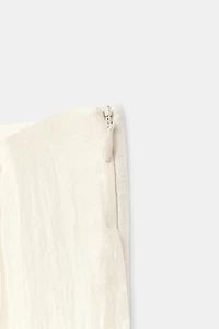 PANTALON LARGE À PLIS