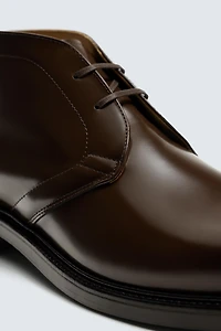 GLOSSY LEATHER BOOTS