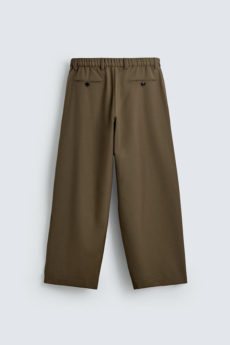 LIMITED EDITION DRAPED CROSSED PANTS