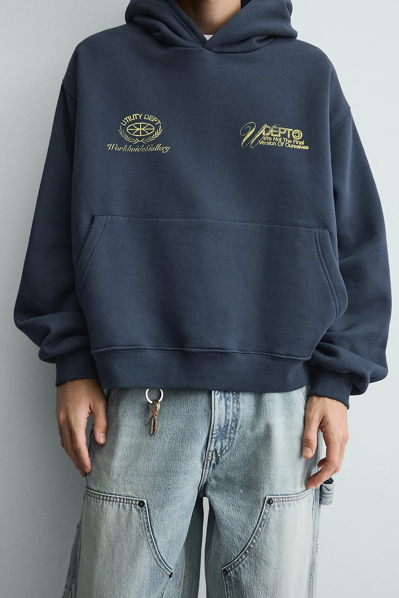 WASHED PRINTED TEXT SWEATSHIRT