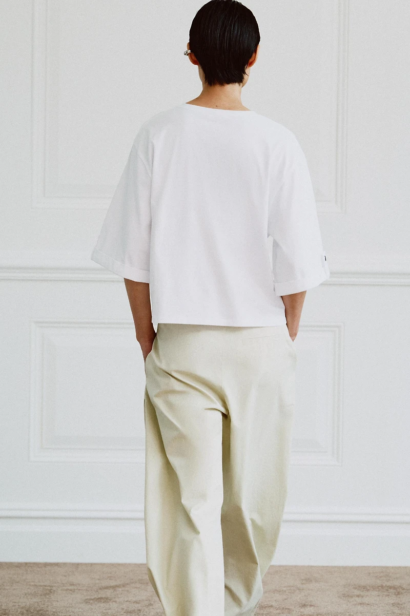 BUTTONED ASYMMETRIC T-SHIRT