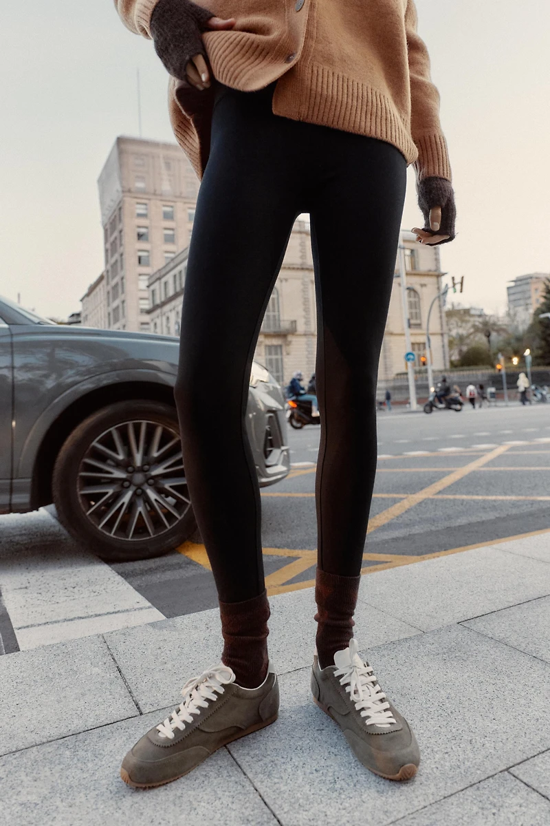 HIGH-WAISTED SLIM PANTS WITH ZIPPER HEM