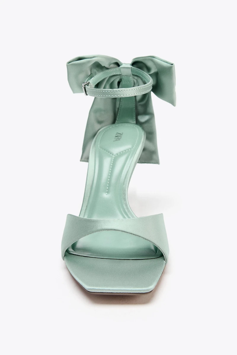MAXI BOW HEELED SANDALS