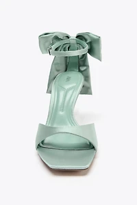 MAXI BOW HEELED SANDALS
