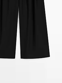 Flowing trousers with darts