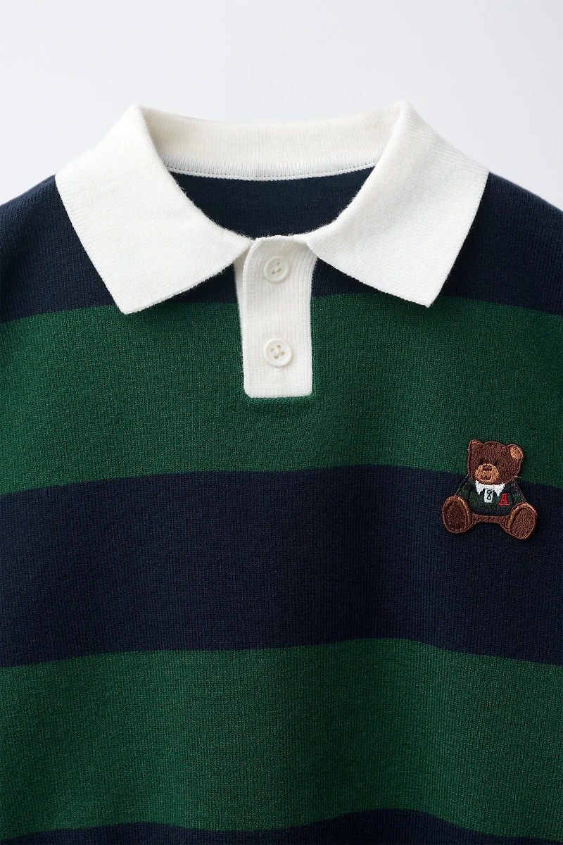 POLO EN MAILLE À RAYURES ET PIÈCE OURS