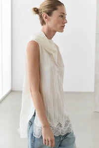 Asymmetric roll neck top with lace detail