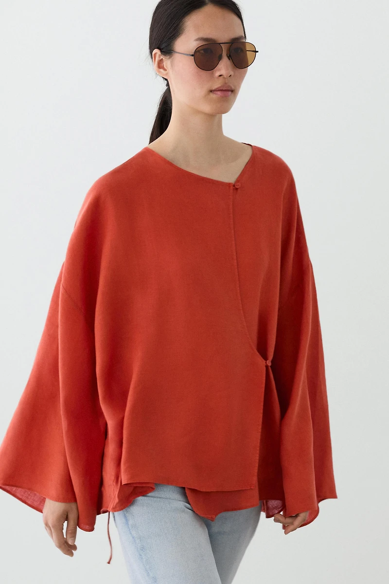 Flowing 100% linen surplice blouse