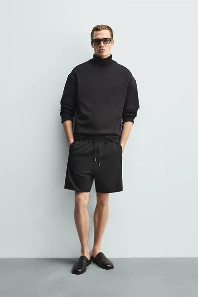 RELAXED FIT INTERLOCK JOGGER SHORTS