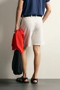 REGULAR FIT PLEATED SHORTS