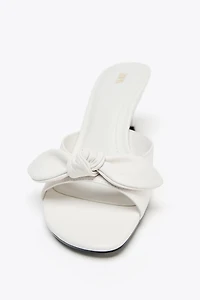 LEATHER BOW HEELED SANDALS