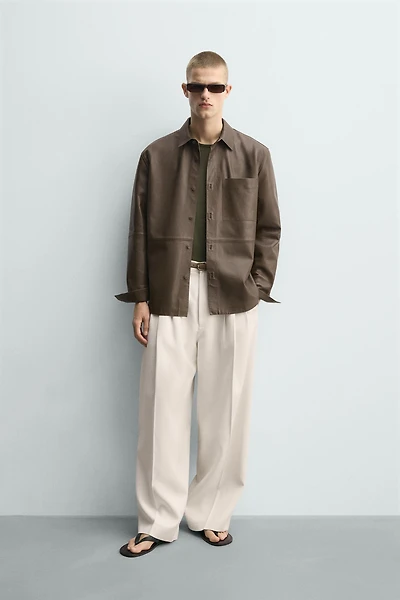 CHEMISE EN CUIR À POCHE