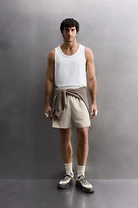 COMBINED PERFORATED SHORTS
