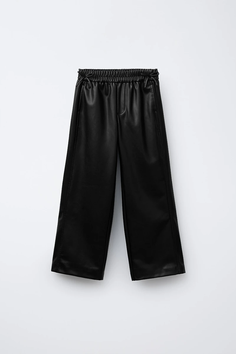FAUX LEATHER BOW PANTS