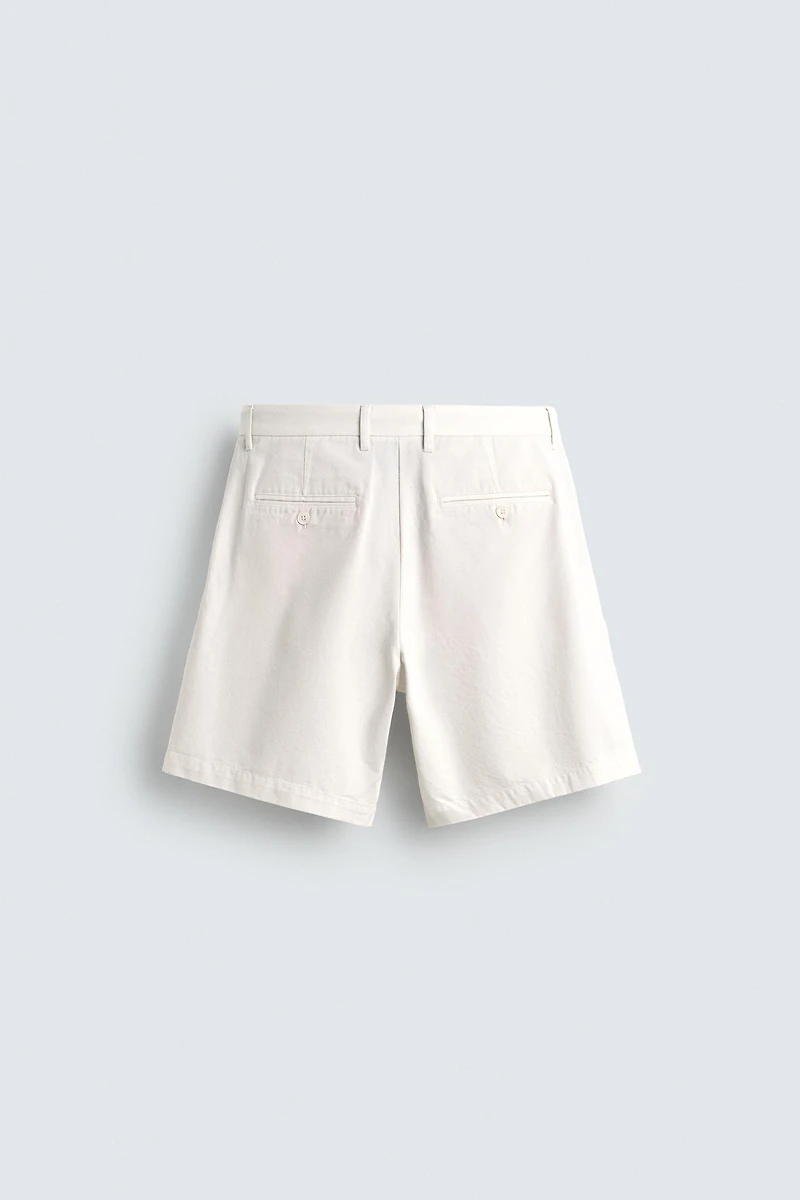 RELAXED FIT PLEATED SHORTS