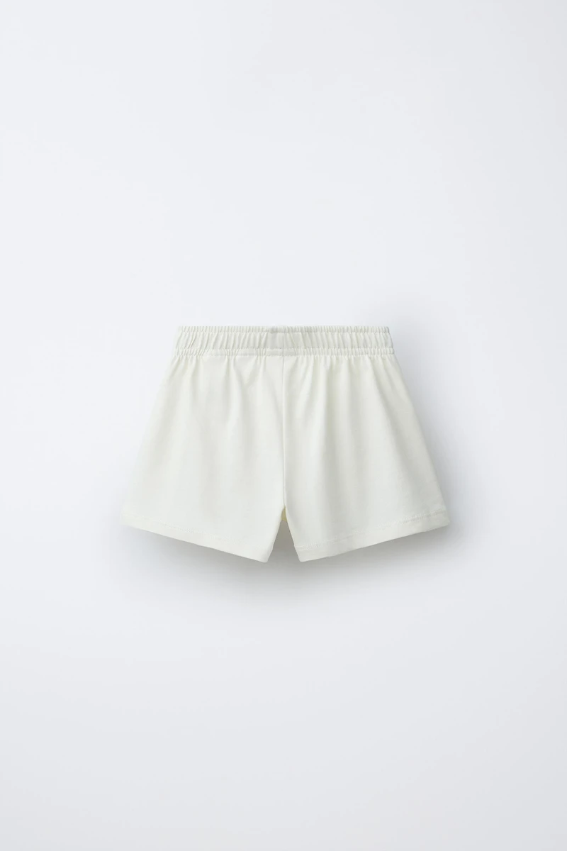 EMBROIDERED PLUSH SHORTS