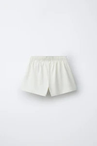 EMBROIDERED PLUSH SHORTS